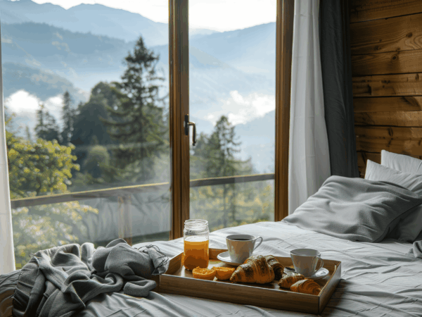 bed-with-pillows-white-sheets-breakfast-with-croissant-coffee-bread-rolls-wooden-tray-generative-ai 1