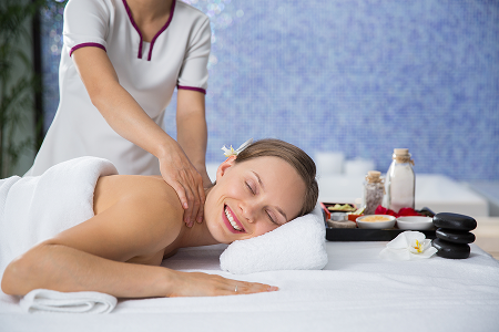 gorgeous-woman-enjoying-shoulder-massage 2